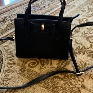 Elegant Black Handbag with Bow Accent